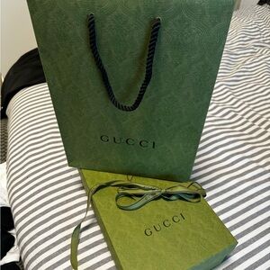 Brand new  Green Gucci box and bag.